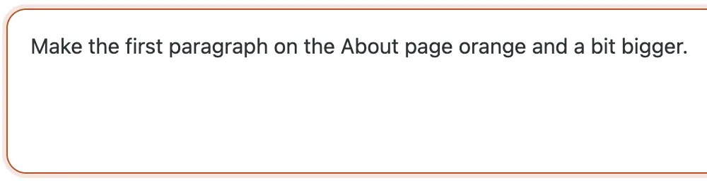The CMSHands chat box with the request typed in: Make the first paragraph on the About page orange and a bit bigger.