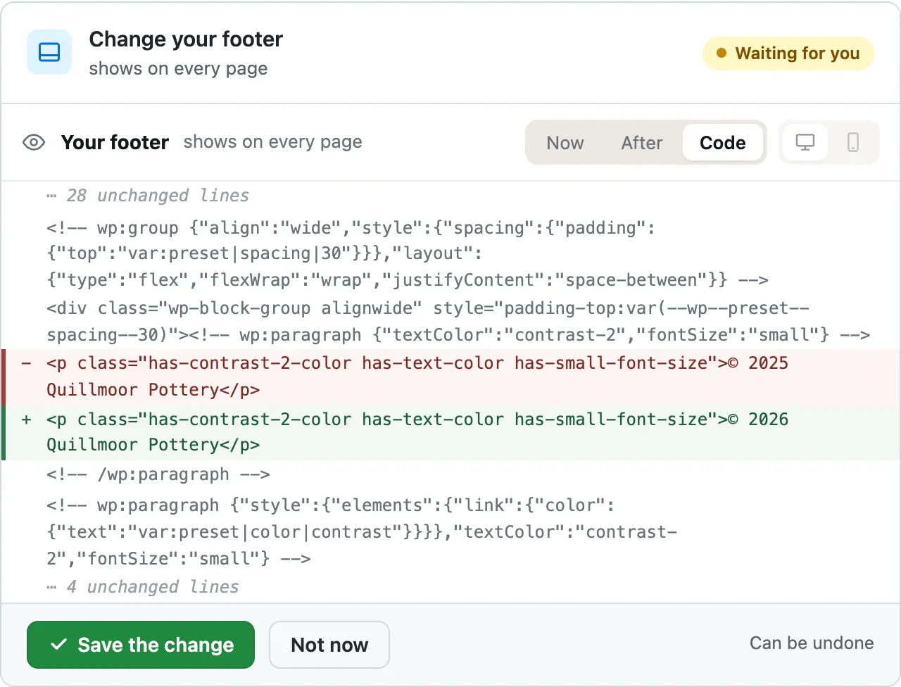 The card's Code view: the old line with © 2025 in red, the new line with © 2026 in green