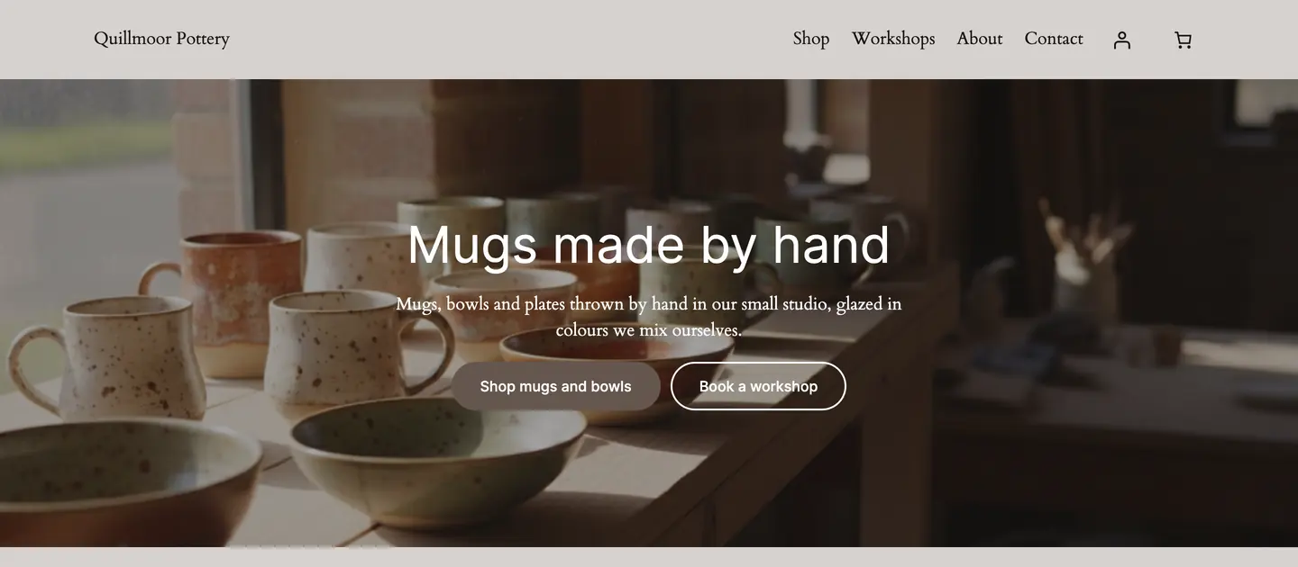 The test site's home page after the change, logged out: Mugs made by hand over the photo of mugs and bowls