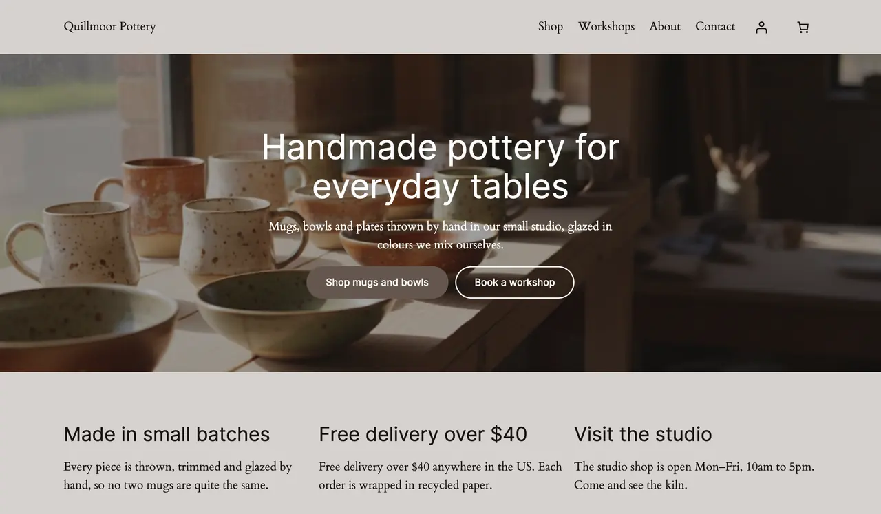 The test site's home page as a visitor sees it: under the pottery photo, the middle column now says Free delivery over $40