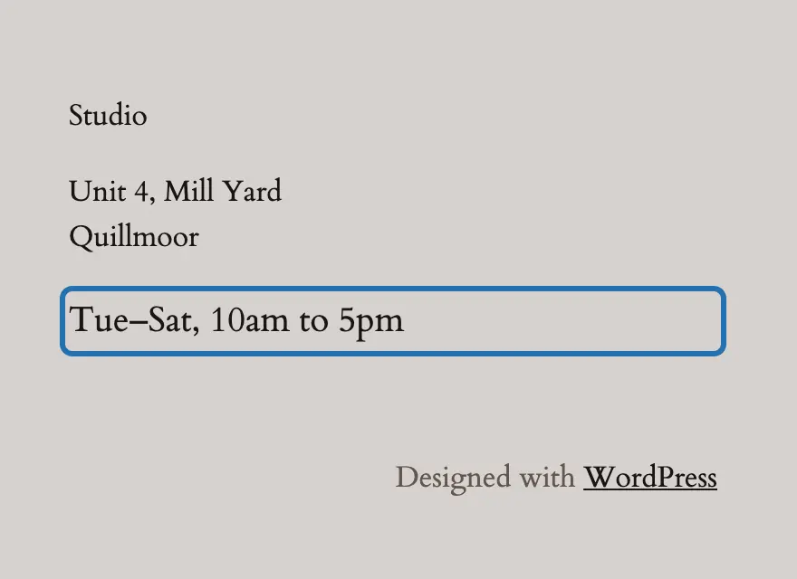The live footer after saving, logged out: Tue–Sat, 10am to 5pm outlined under the studio address