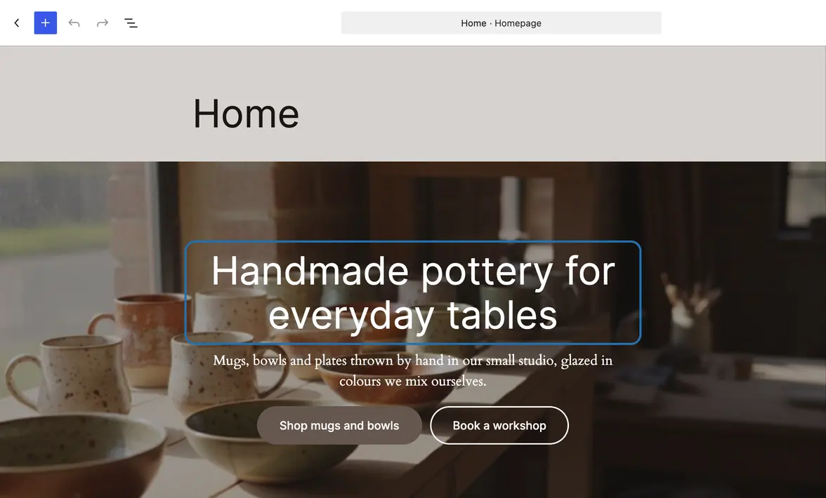 The home page open in the editor, its big heading over the photo outlined, ready to click and retype