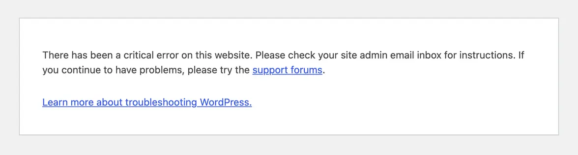 The dashboard during a plugin crash: a critical error, and Please check your site admin email inbox for instructions